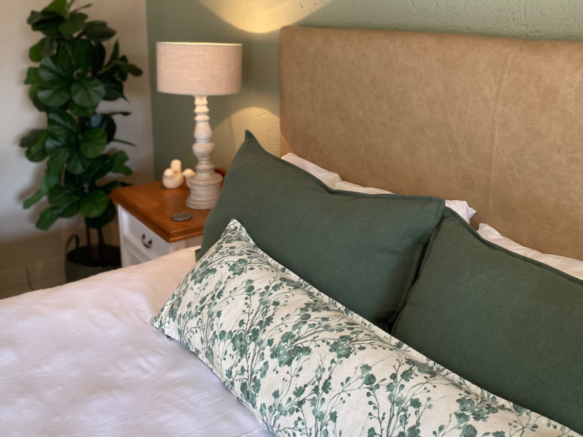 Earthy green bed pillows