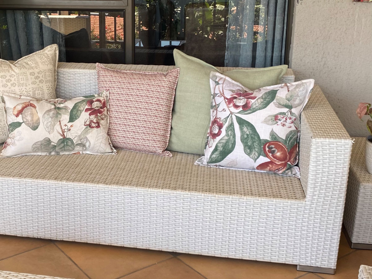 Garden couch with pillows